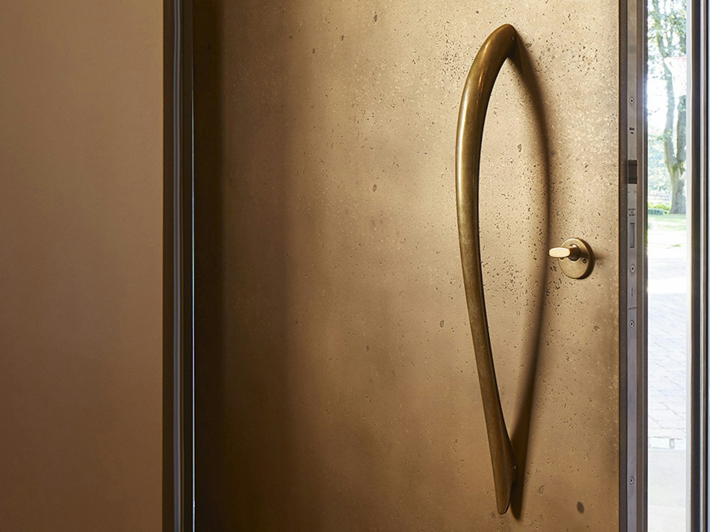 bz4 bronze handle on a vintage bronze door urbanfront