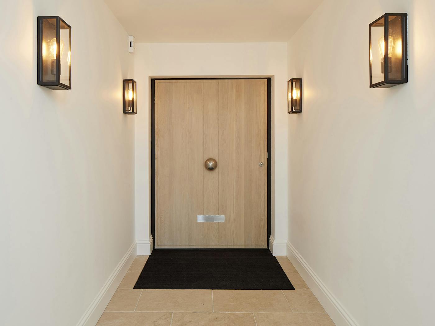 And internally, the clients opted for a simple white oil wash to lift the yellow tones of the oak for their light and bright entrance hall