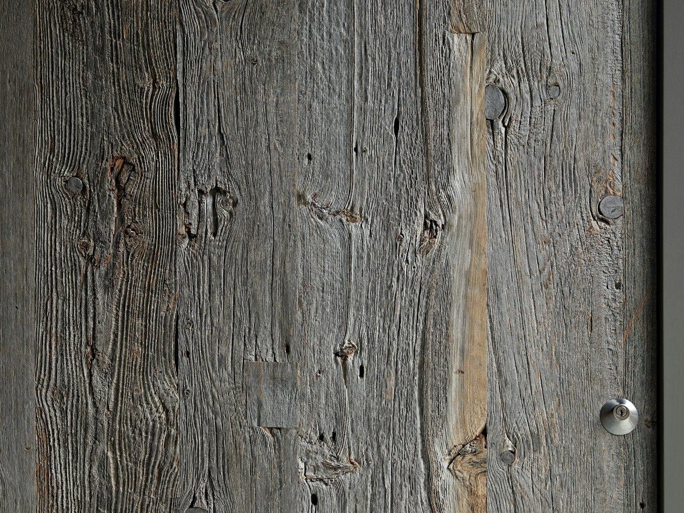 The beauty and history of reclaimed wood can be seen in the grain detail