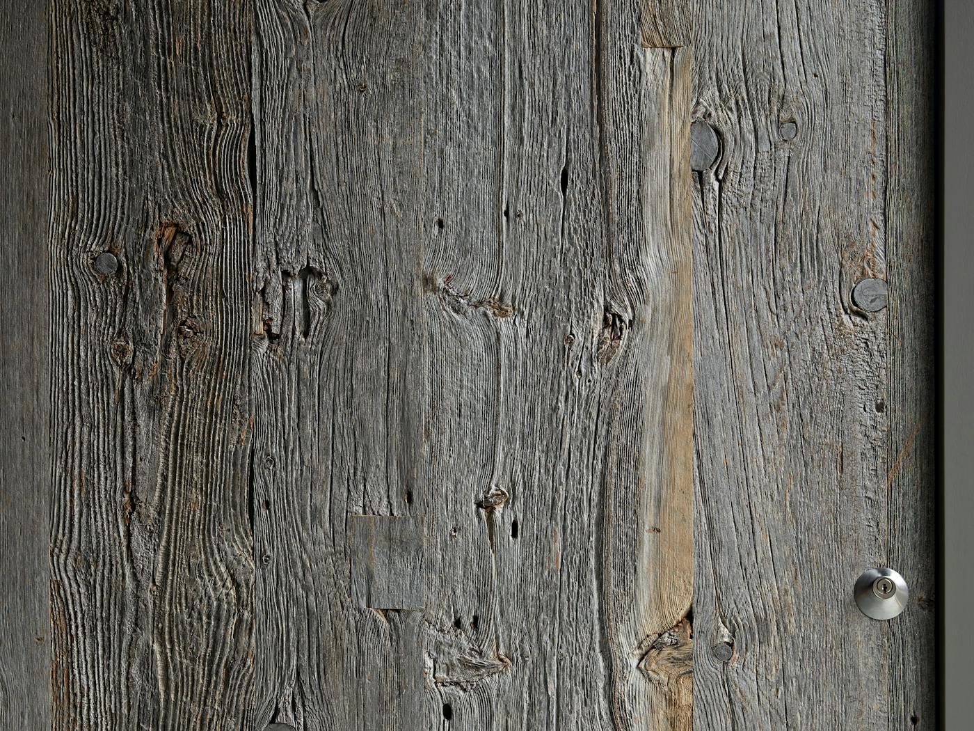 The beauty and history of reclaimed wood can be seen in the grain detail