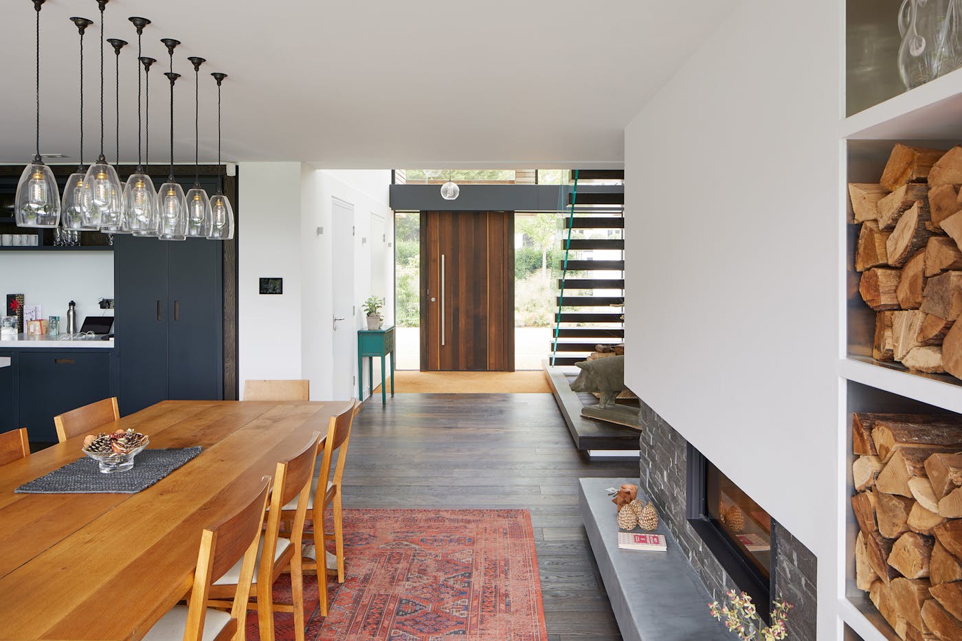 A spacious open plan interior is accented by different woods but the non-fussy detailing keeps everything working cohesively