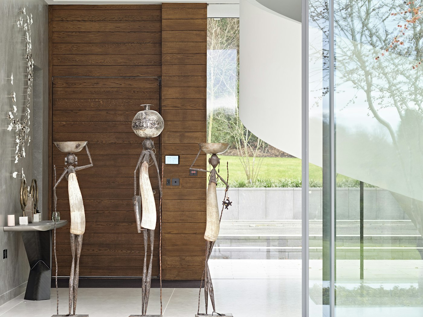 Beautiful sculptures give the finishing touch to this spacious hallway