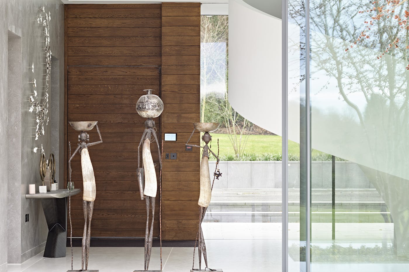 Beautiful sculptures give the finishing touch to this spacious hallway