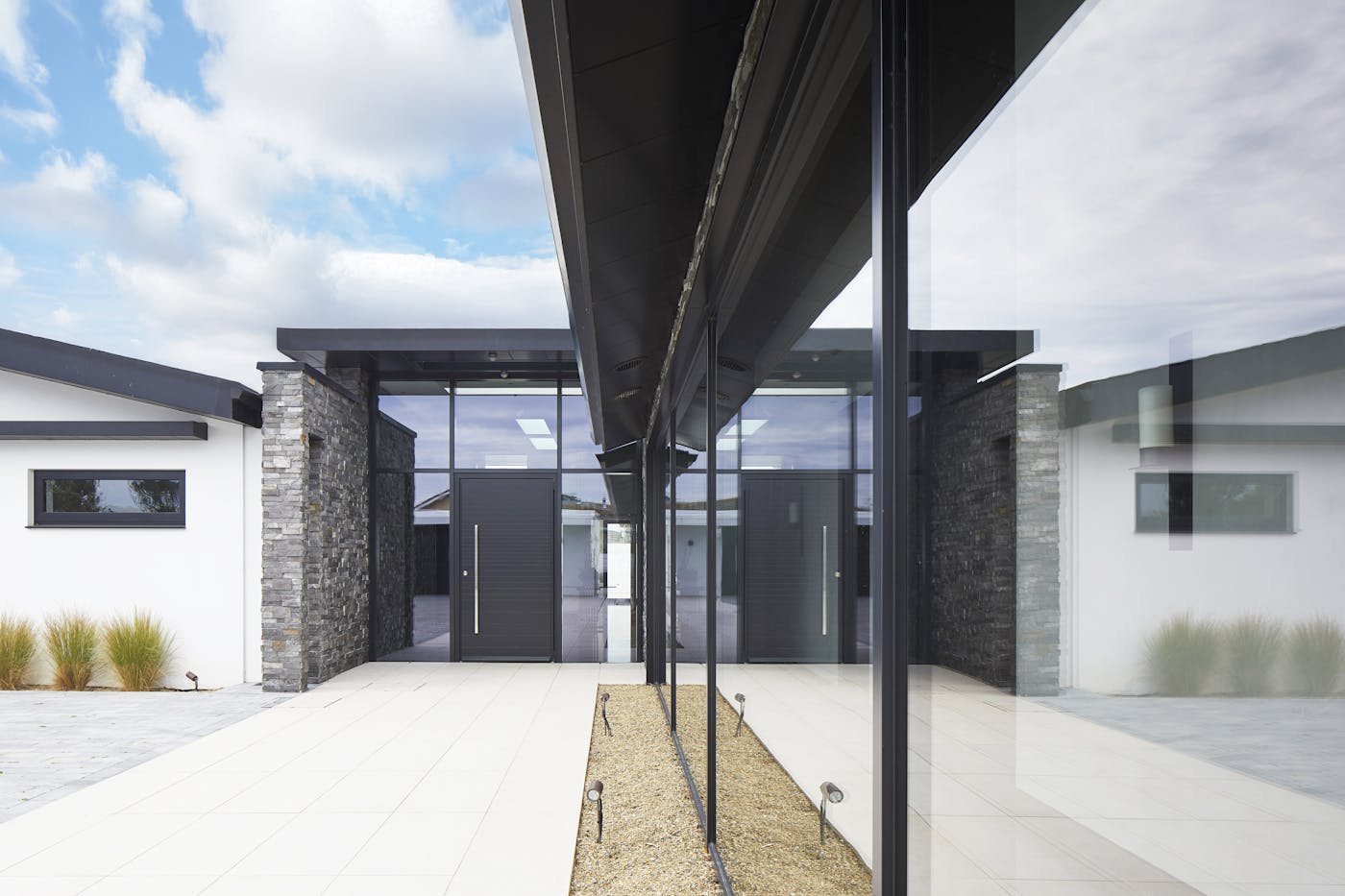 The monochrome design makes a statement within impressive glazing