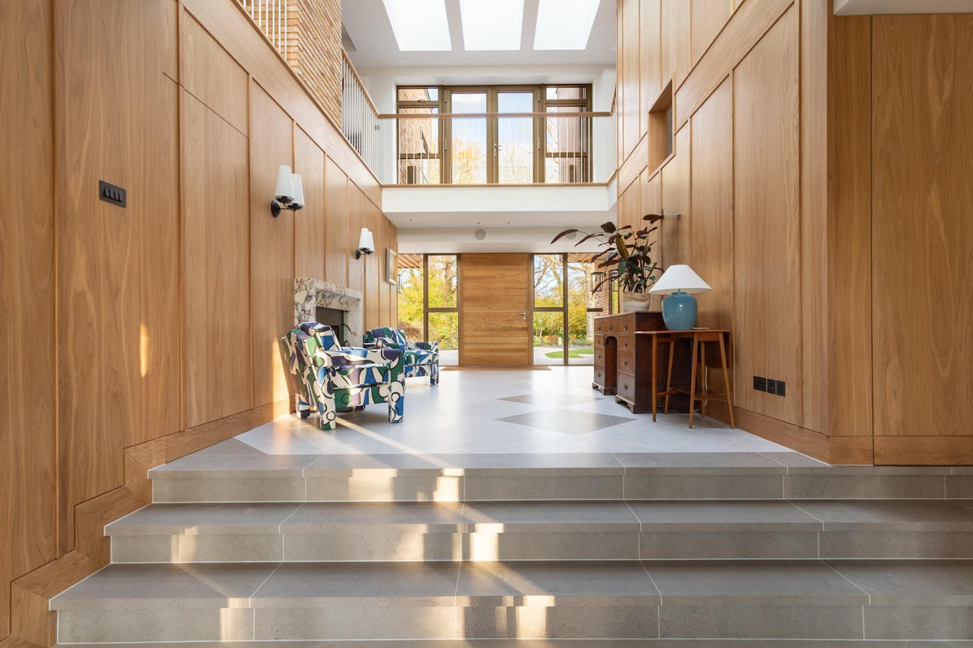 Glazing and warm oak used beautifully to create a light and inviting space