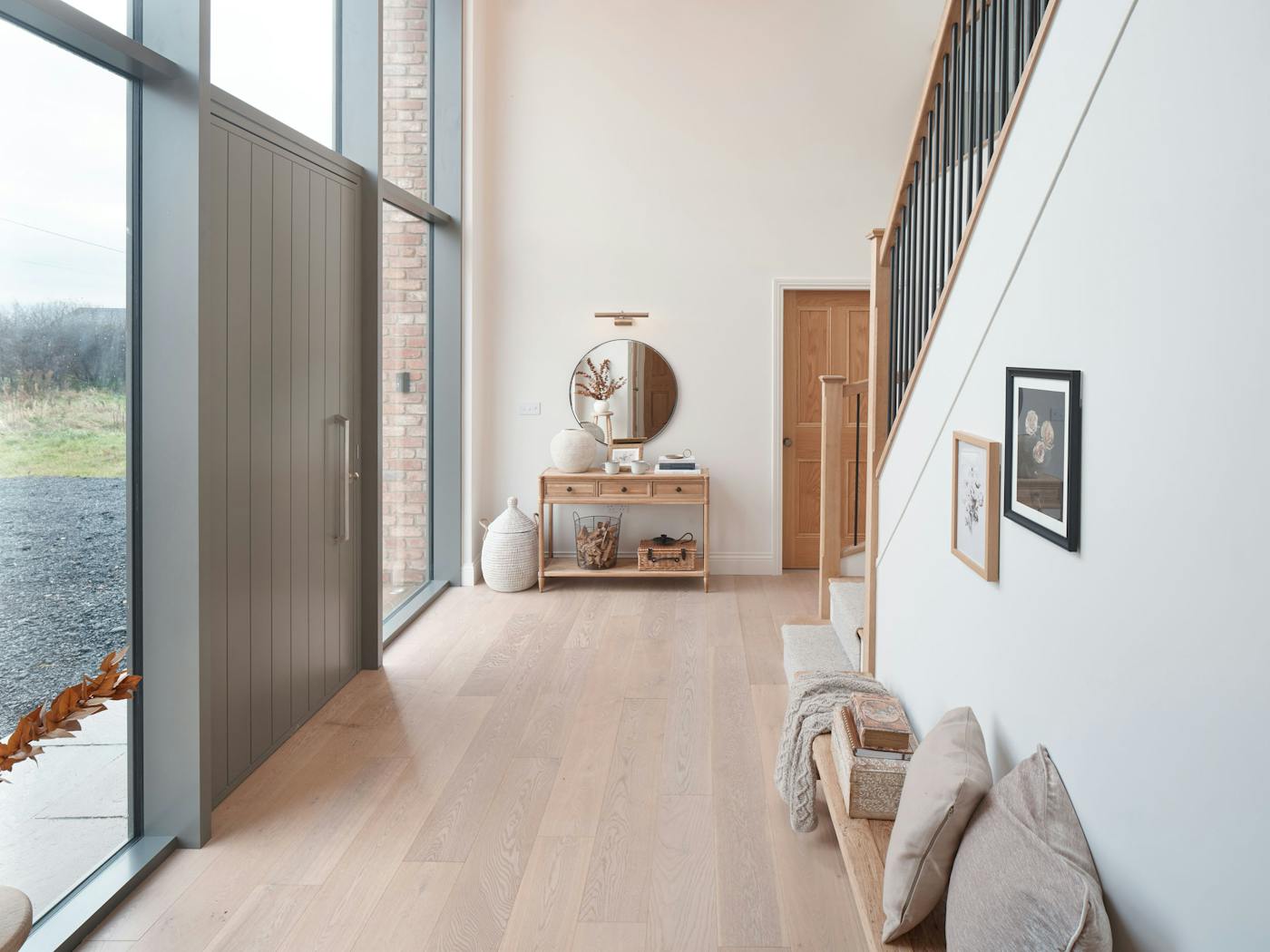 Warm tones and somewhere to sit make this grand entrance feel welcoming