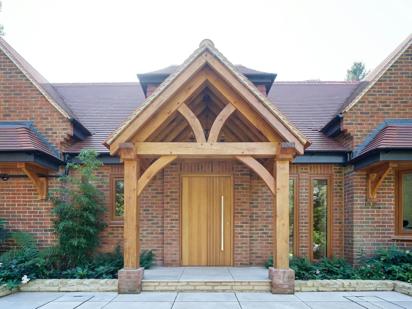 Oak framed canopy beautifully frames the oak Bari door
