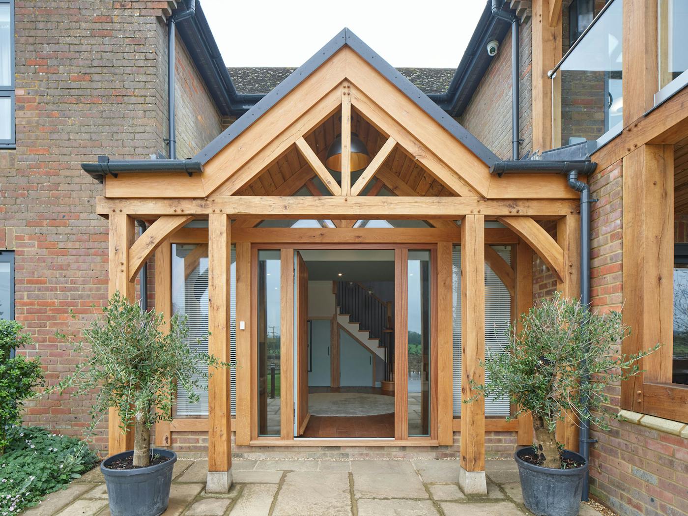 Rondo V in iroko creates an impressive but welcoming entrance to the house