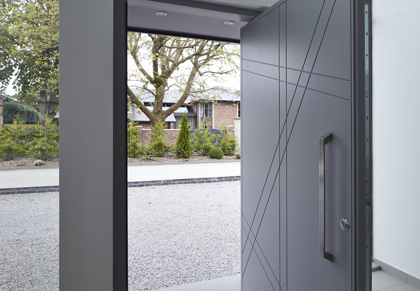 ﻿A slanted square edged solid stainless steel pull handle