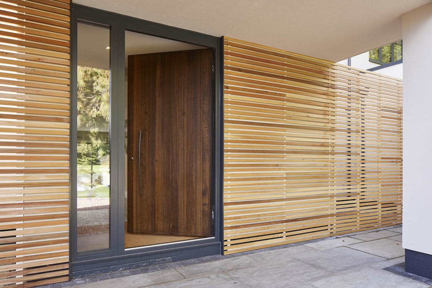 Essential factors door with sidelite