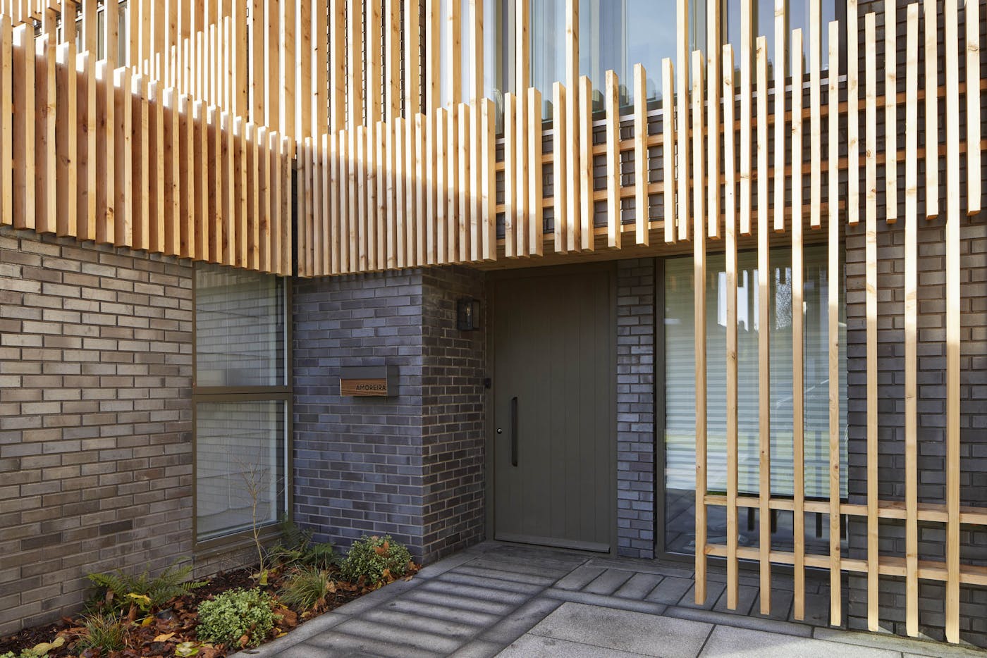 Essential factors house with cladding