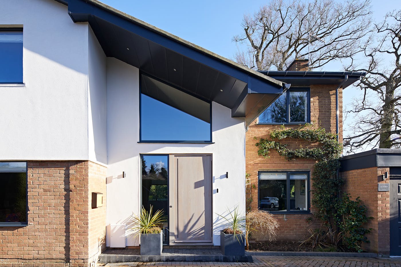 The roof & soffit of this house create an extensive overhang