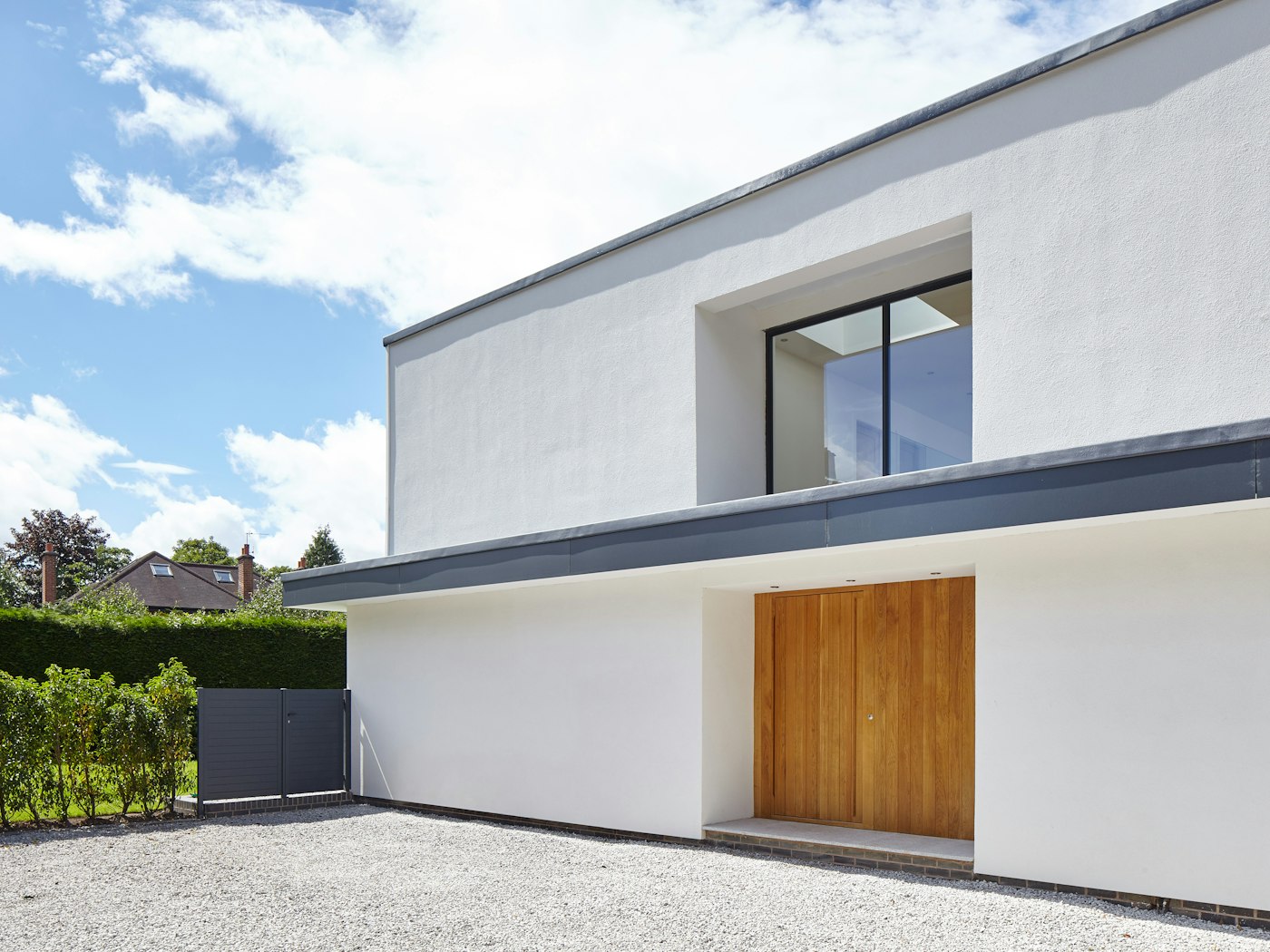 This flat overhang forms a part of the building design and gives excellent coverage to the flush front door