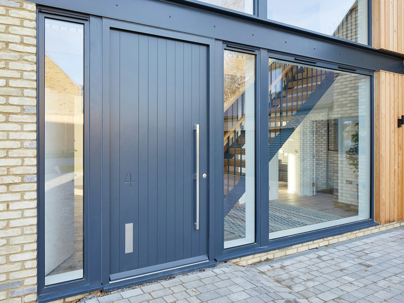 A hinged, painted door can also offer an easier life if a canopy or porch protection isn't an option