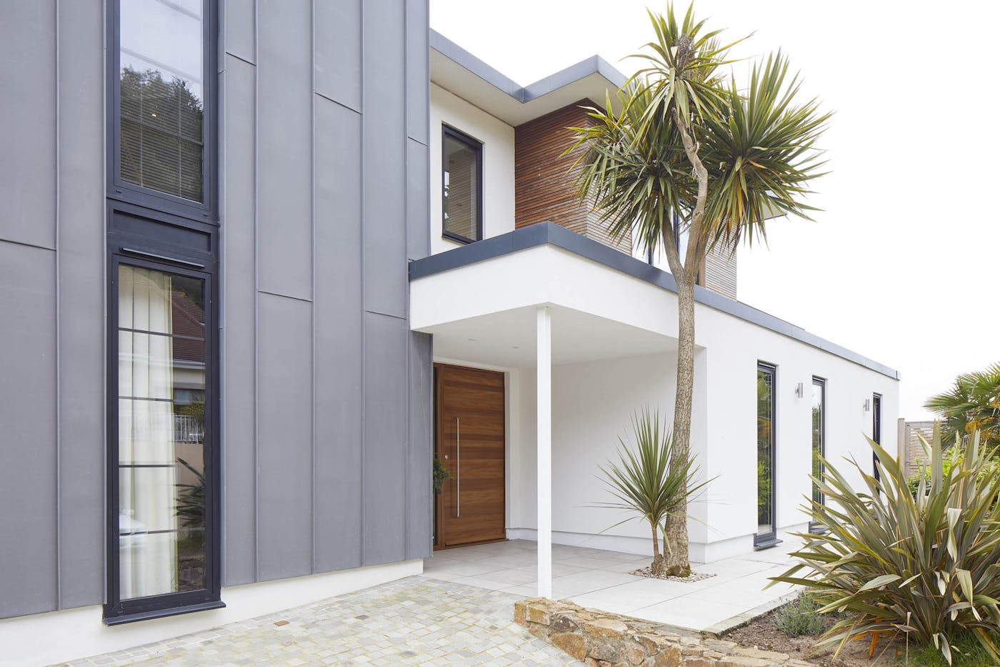 A modern front door canopy for a modern front door