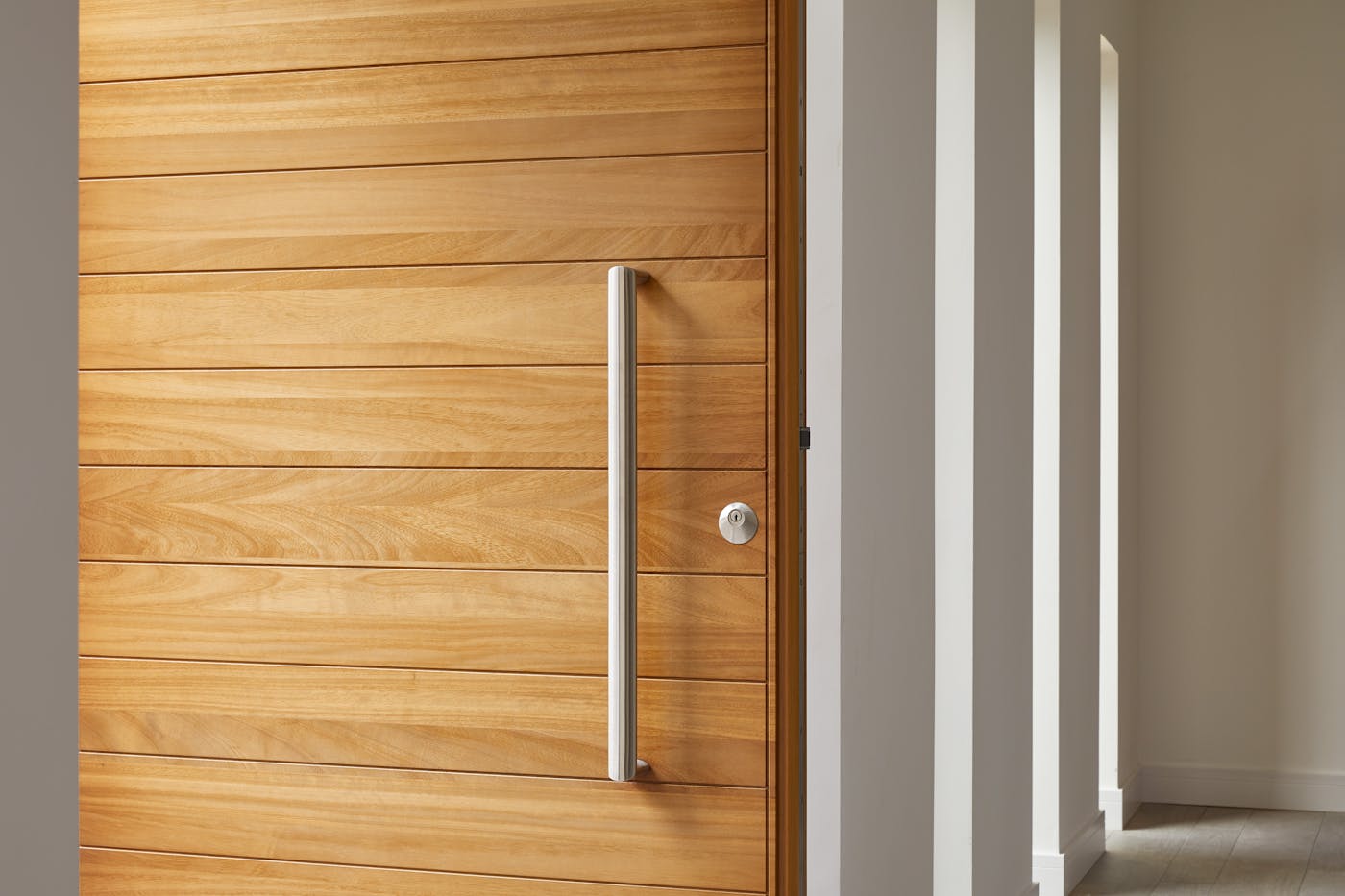 A lighter wood might be a better choice if you aren't able to have a canopy or porch