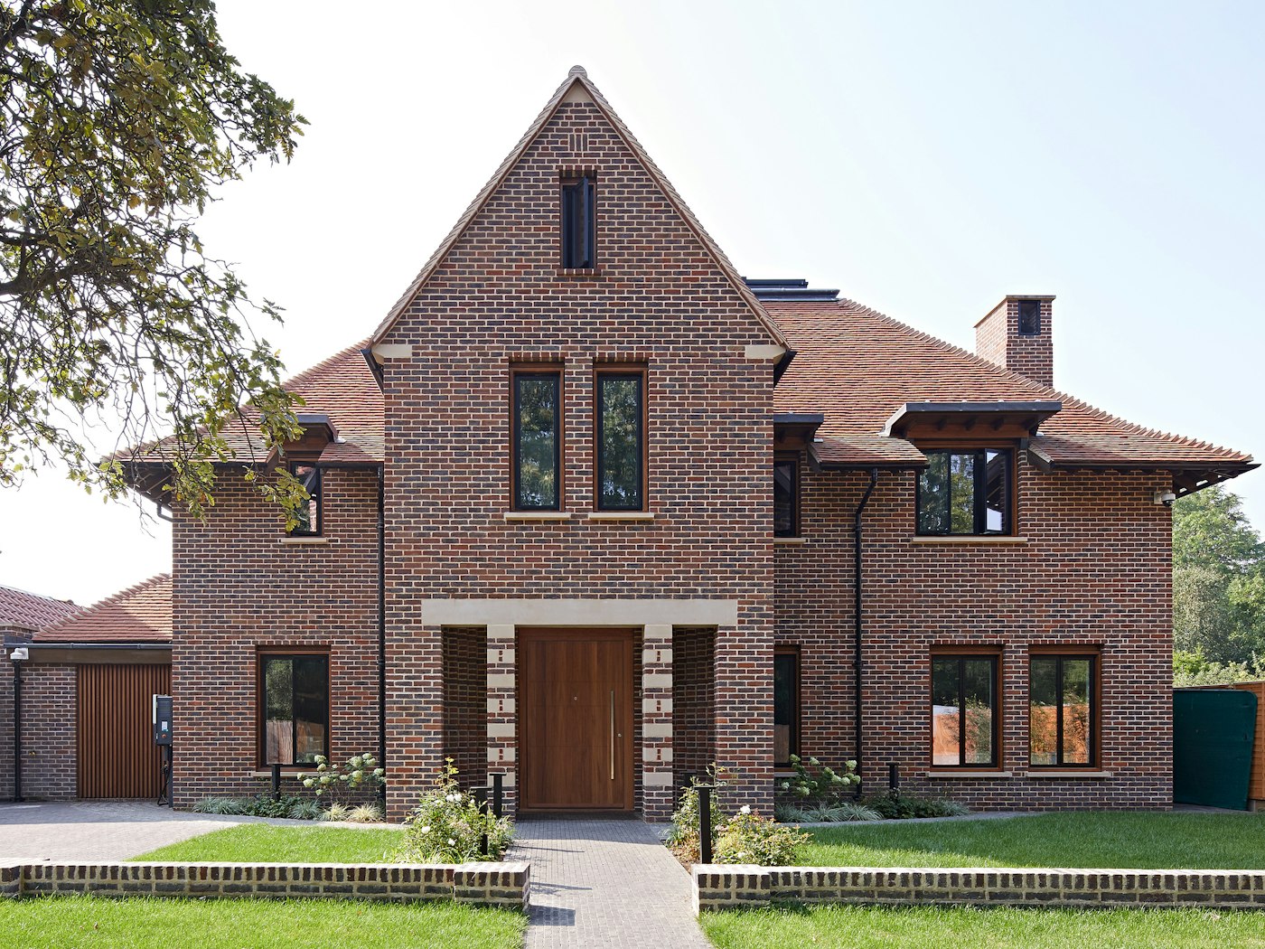This more traditionally styled brick house has been given a contemporary update with our Quattro front door