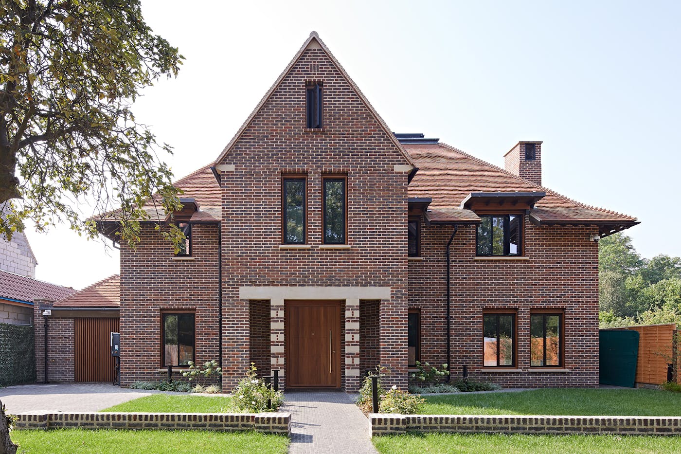 This more traditionally styled brick house has been given a contemporary update with our Quattro front door
