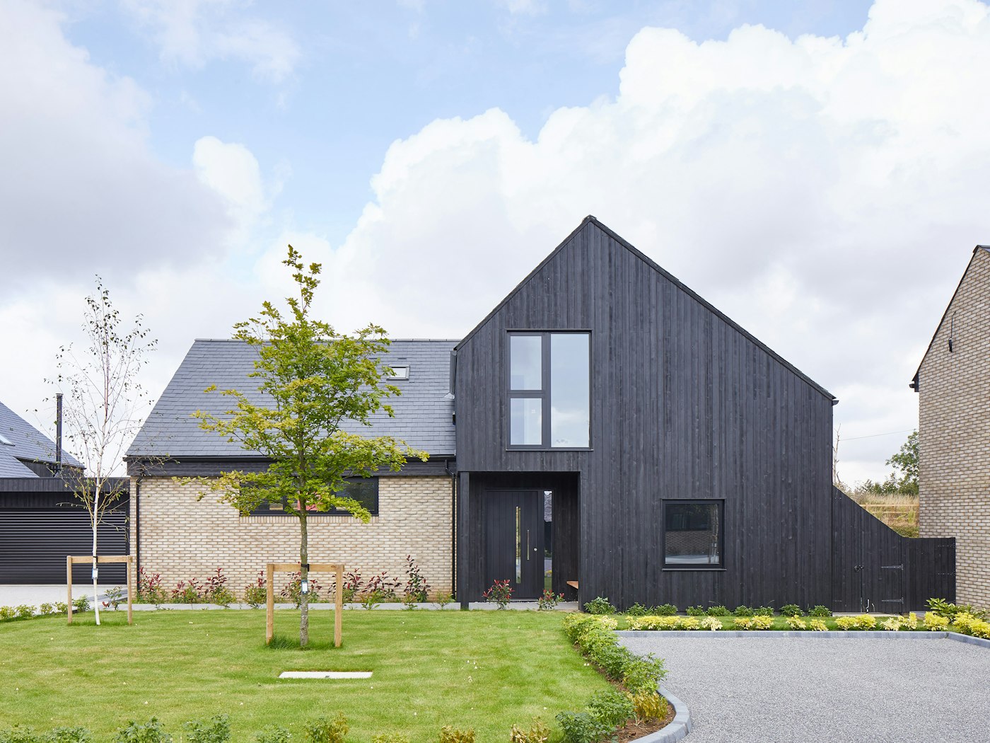 And while this house uses mixed materials, the entrance is dominated by the charred cladding and matching door