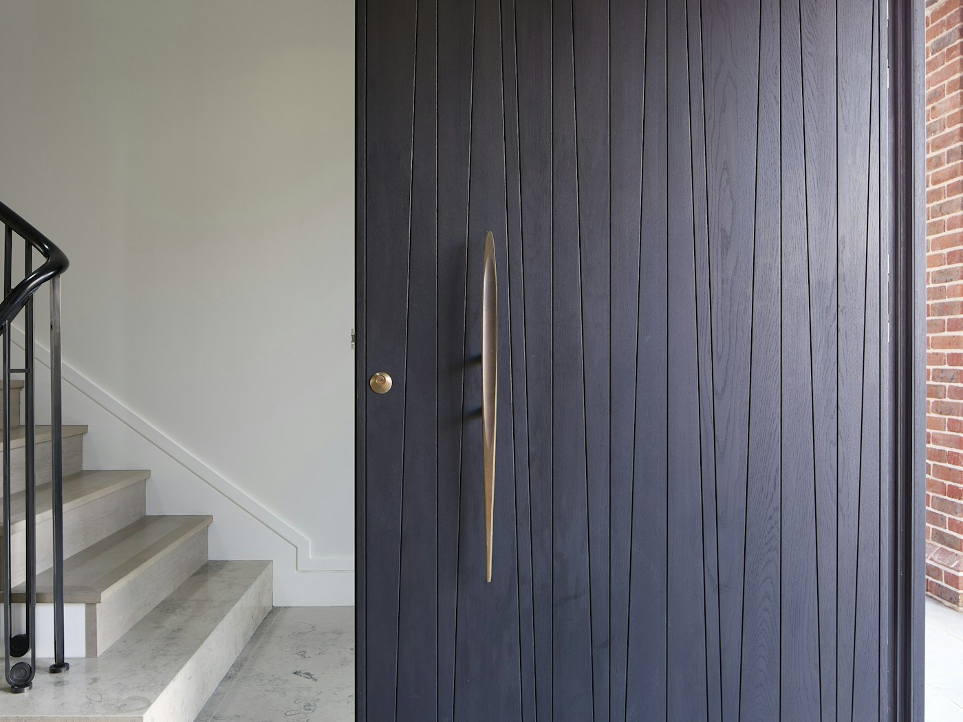 Choosing attractive and eyecatching door furniture can offer additional interest to doors not matching black cladding