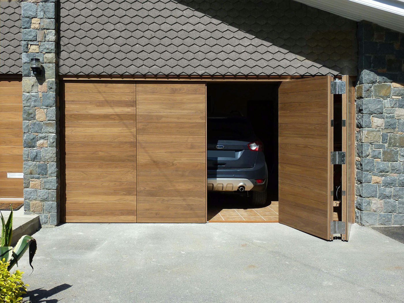 bifold garage door in a parma design