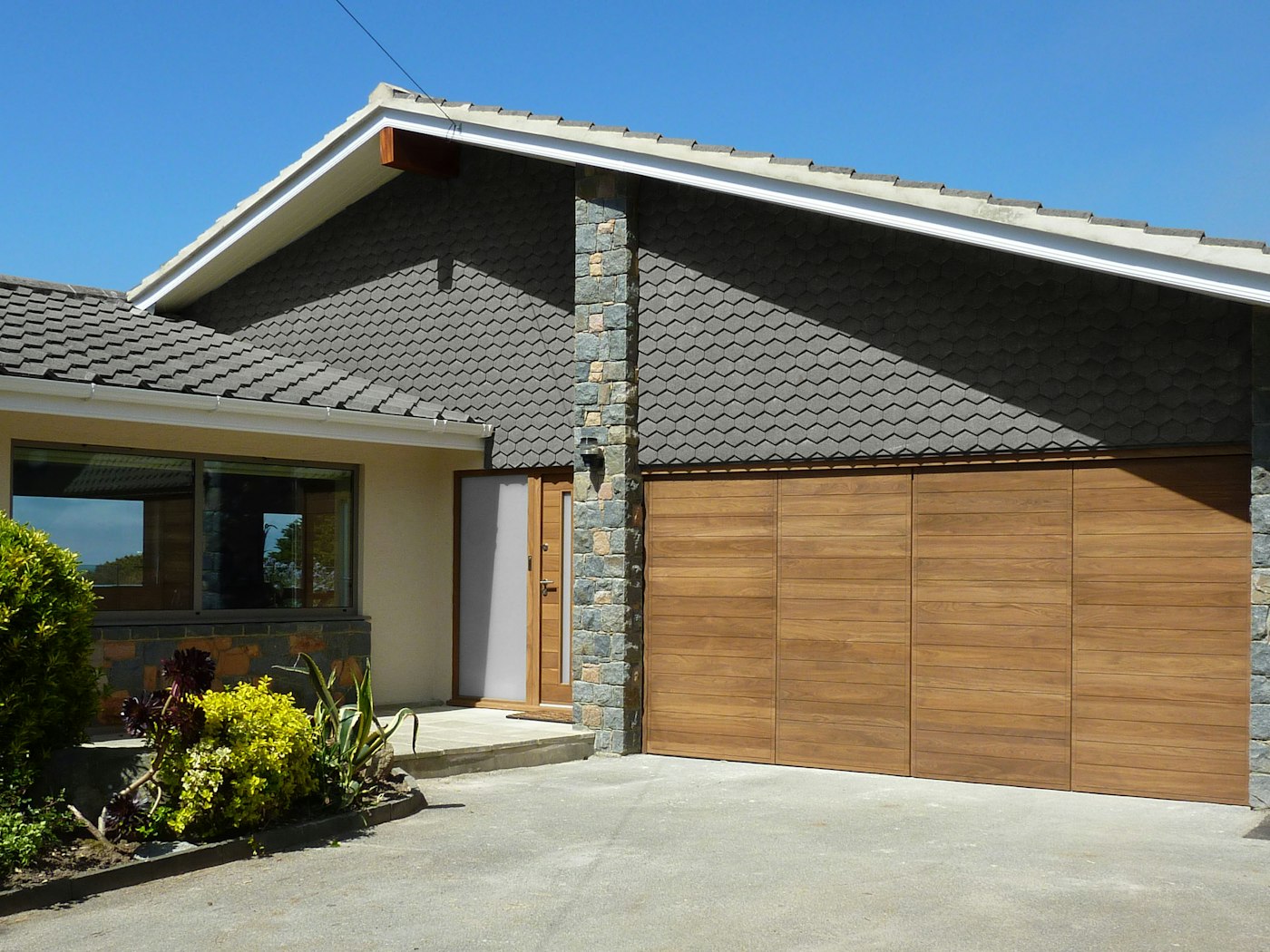 bifold garage doors in a parma design