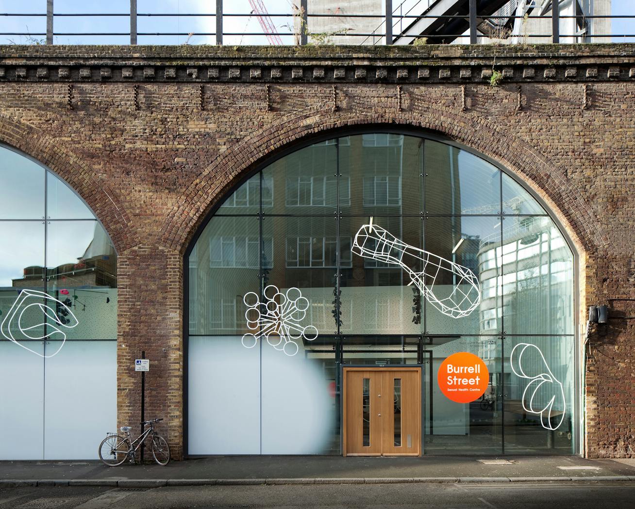 This hospital clinic is a great example of how a door can be dwarfed by glass but still achieve its purpose