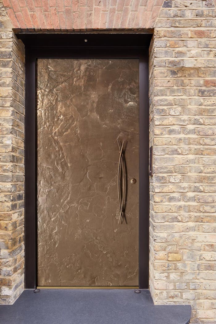 Bronze ref. 101: Modern opulence is the statement of the day with our signature, textured bronze door finish