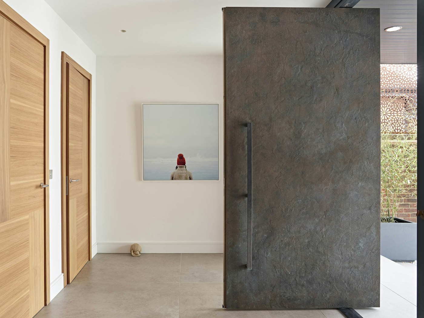 Another Bronze 101 - this door is situated right by the sea & some natural light oxidisation of the metal has started to occur. Oxidisation can be prevented/slowed down with regular maintenance but many clients like the way the metal naturally evolves