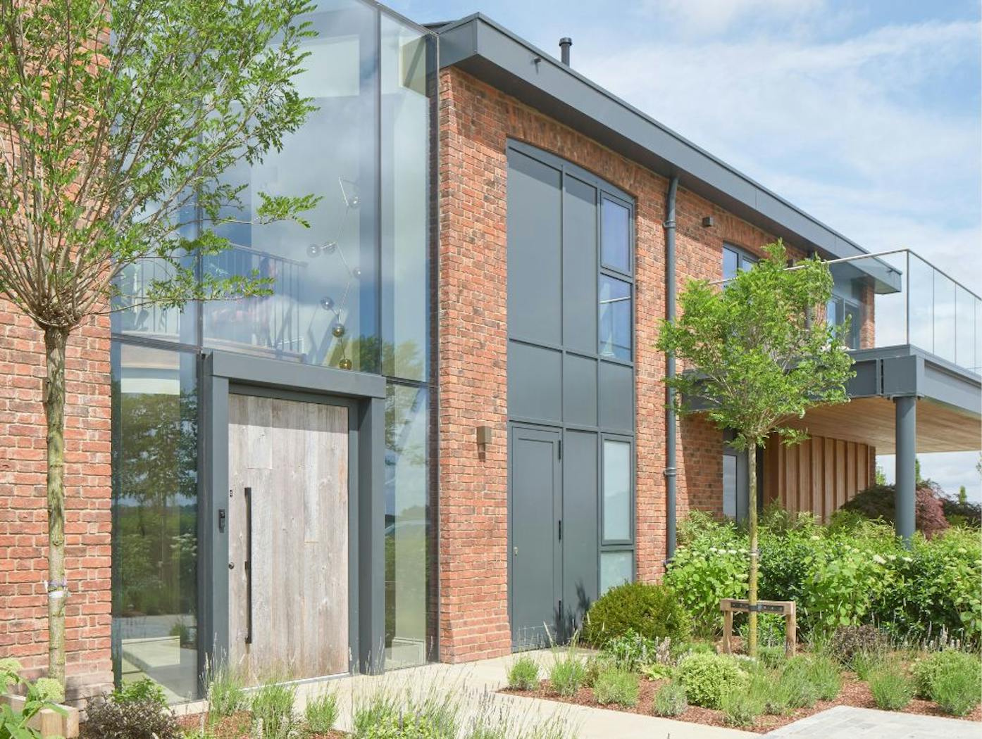 Barn door with Milano V internal in RAL grey13
