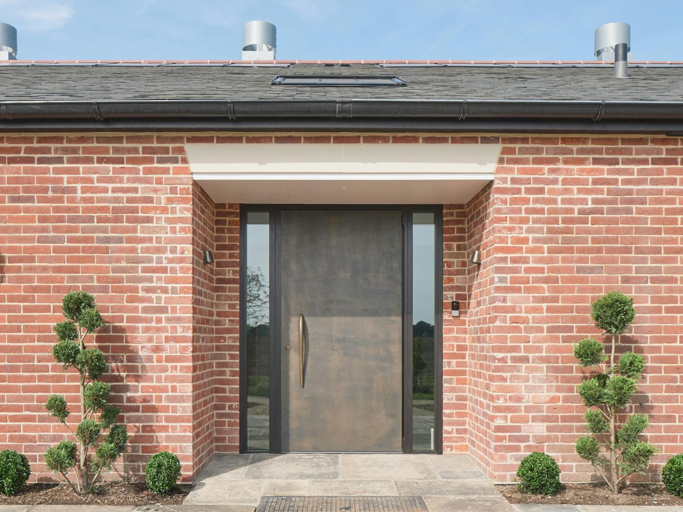 Raw bronze for dual door blog