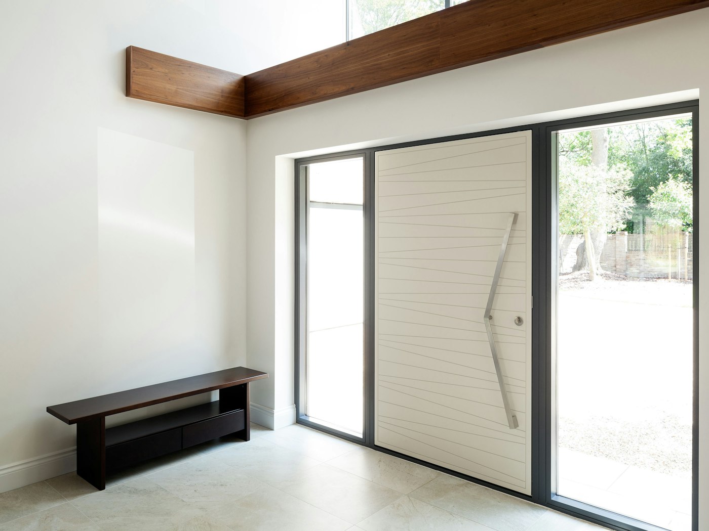 The glass panels next to the front door allow extra internal light