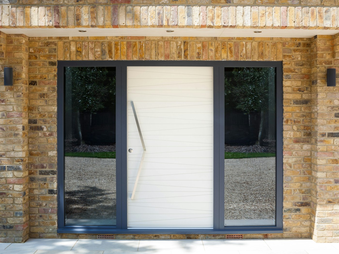 The Milano front door is painted white with an anthracite frame  