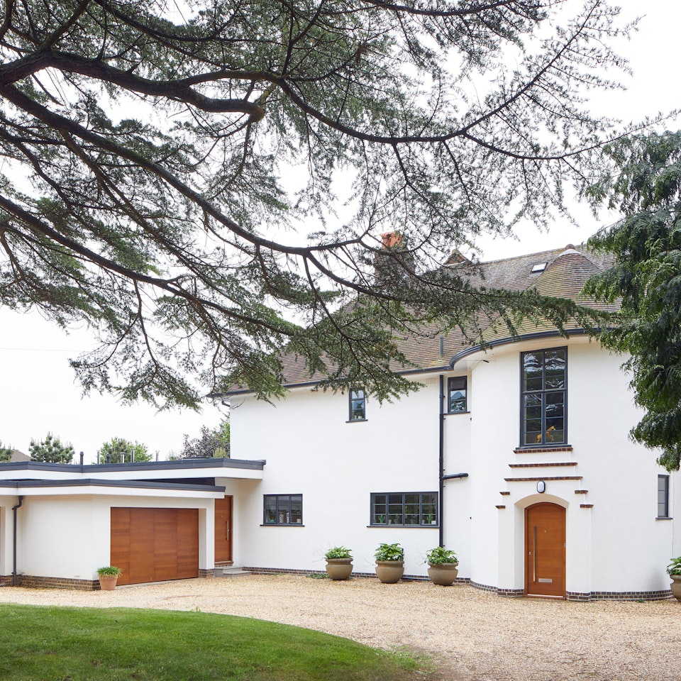 A 1930's house remodelled with matching front and garage doors