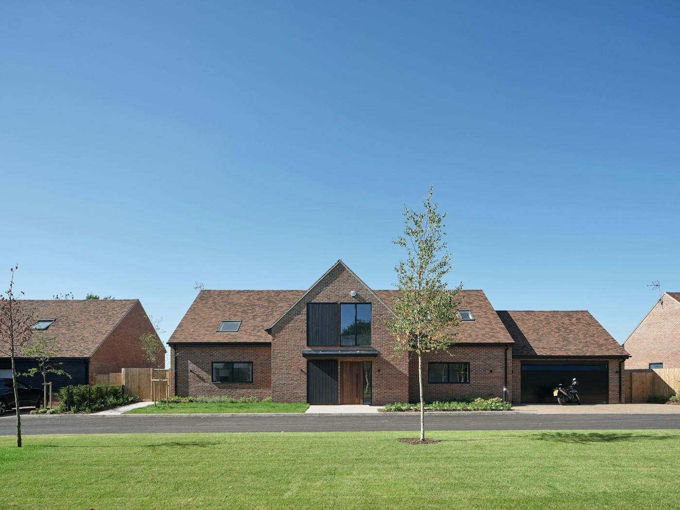 Rockwell house design 3 with Raw V fumed oak option11 black door Urban Front