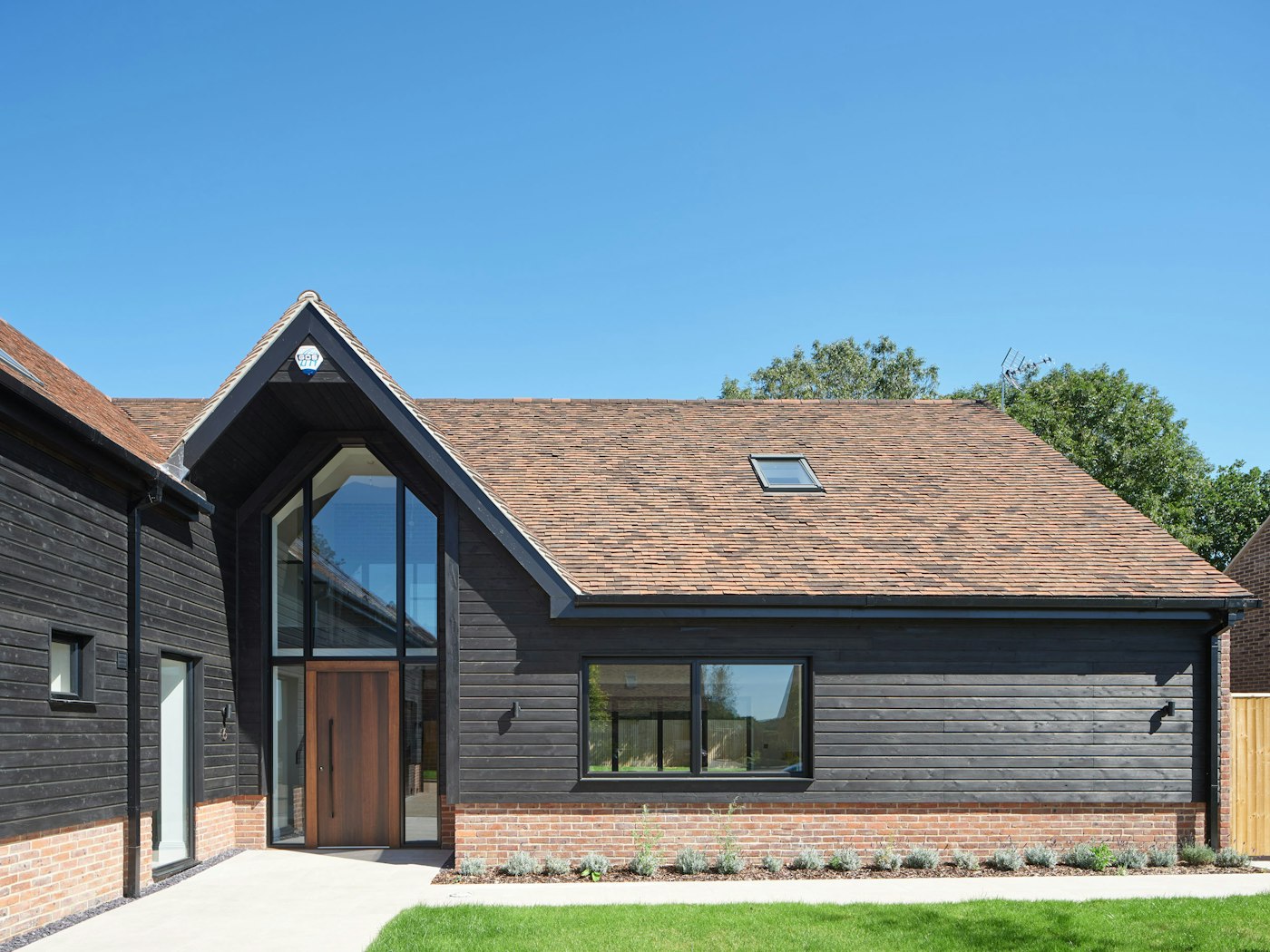 Rockwell house design 4 with Raw V fumed oak option11 black door Urban Front