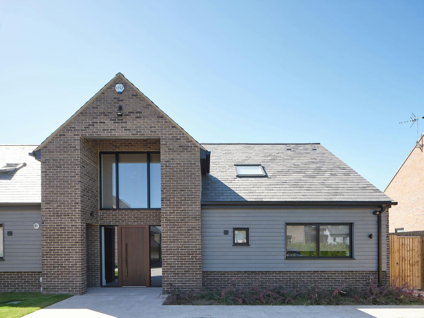 Rockwell house design 5 with Raw V fumed oak option11 black door Urban Front