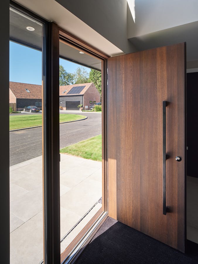 Rockwell raw v fumed oak option11 black door Urban Front LR 025