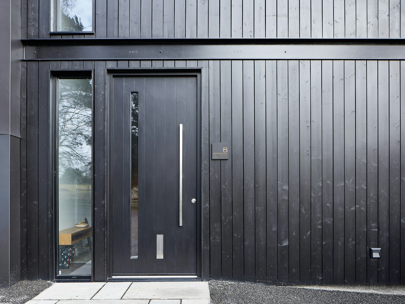 They each feature Urban Front's Terano black front door with glass vision panel