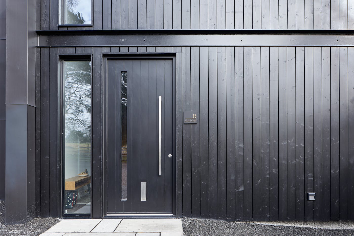 They each feature Urban Front's Terano black front door with glass vision panel