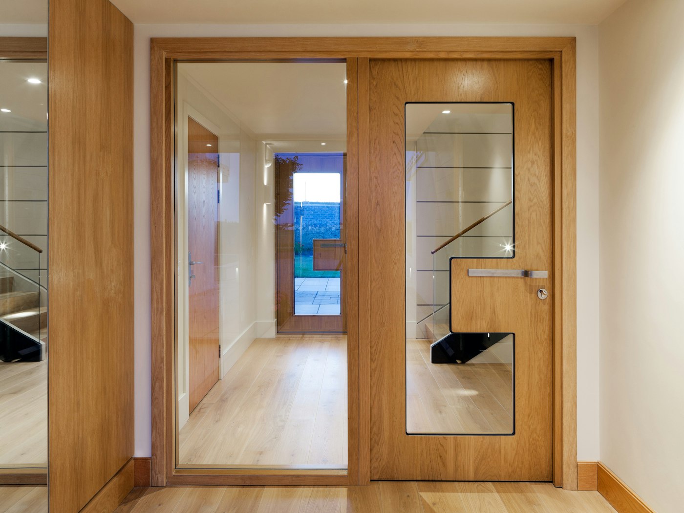 The internal doors are Urban Front's Ice style which also feature glass heavily as part of the design