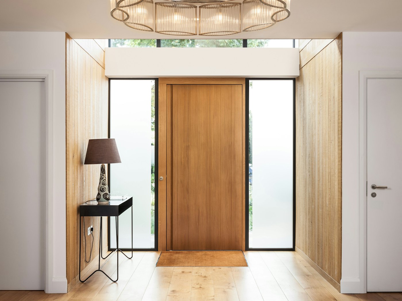 This front door features two glass side panels (side lights)