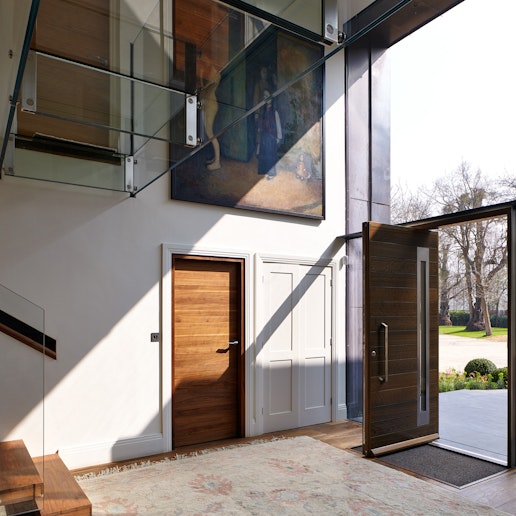 The glass frontage sheds spectacular light on the front and internal doors