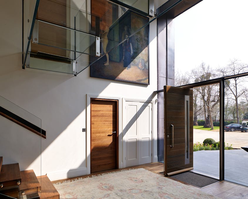 The glass frontage sheds spectacular light on the front and internal doors