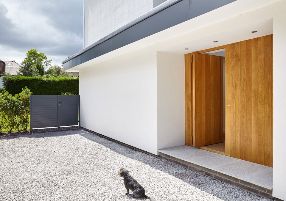 The additional wood side panel gives the impression of a larger entrance