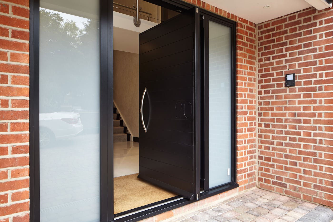 The pivot opening style adds to the contemporary look