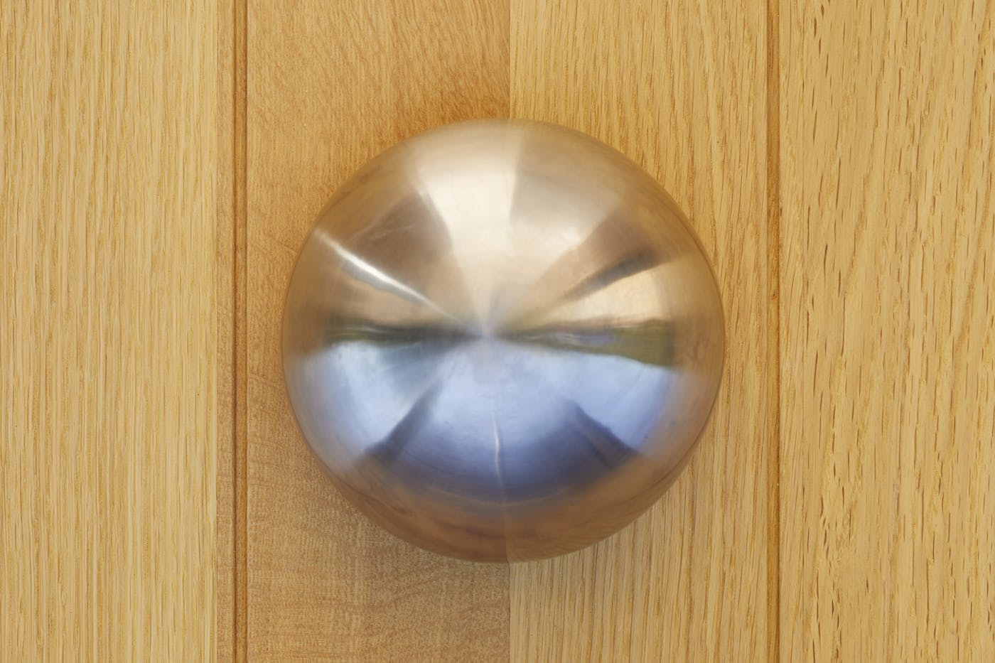 Complementing the look further is the statement round button handle