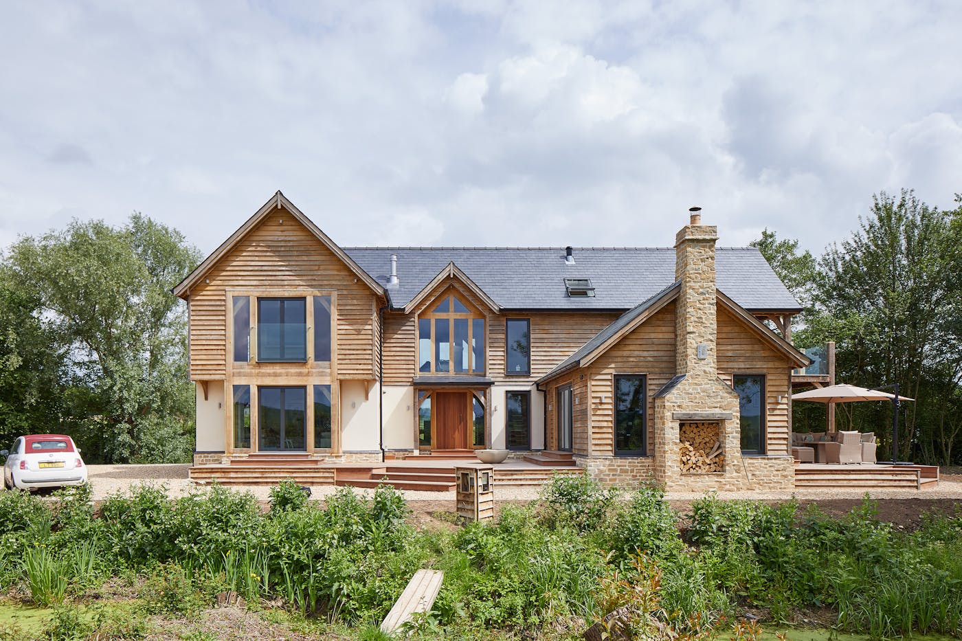 Grand but traditional styling - this oak house features an iroko front door by Urban Front 