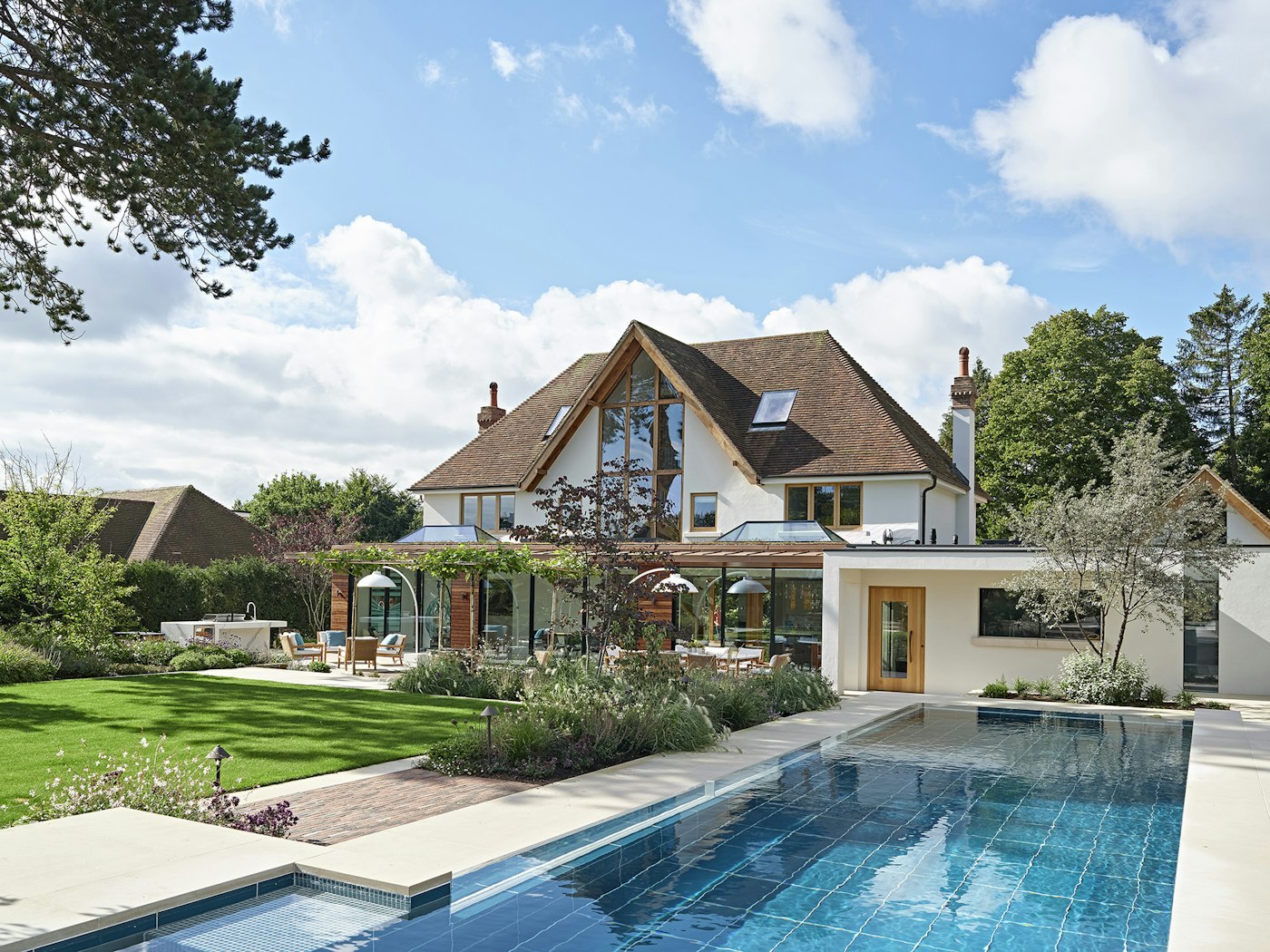 The back of the house is equally impressive with a beautiful pool