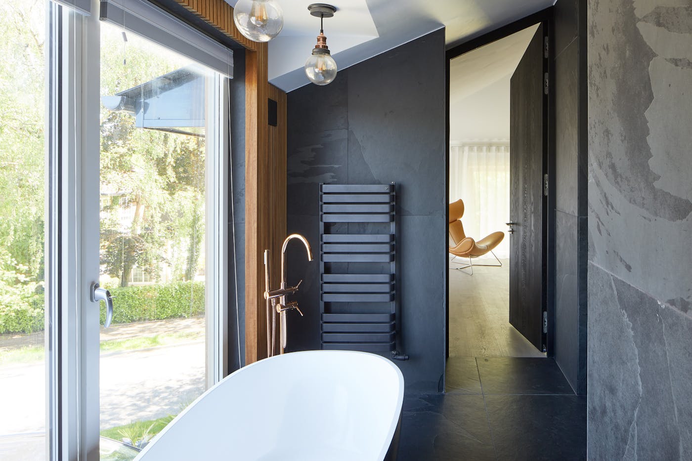 Time to relax - the additional upstairs space gave the Assafs room to create a dream en-suite complete with peaceful views from the large windows